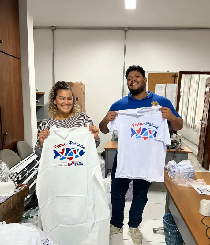 Material promocional da feira sendo organizado para o repasse aos pontos de venda.